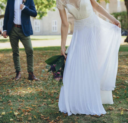 Wedding couple posing together, happy bride and groom.の写真素材