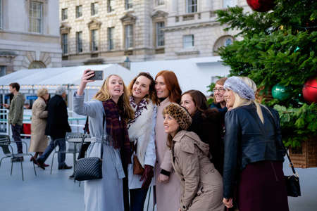 Copenhagen, Denmark 19 November 2016. Girls taking a selfie. Christmas time in Copenhagen, Denmark Lifestyle and Culture.のeditorial素材