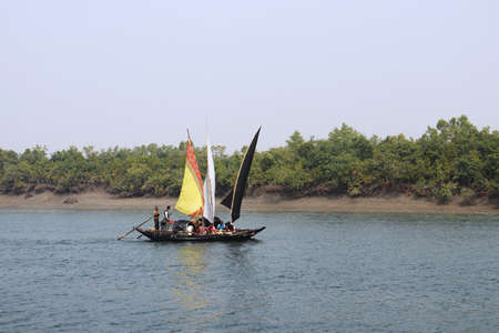 Sunderban, India - January 7, 2020:  Fisherman on a Fishing boat