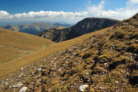 Mountain Landscape with blue sky and white clouds 