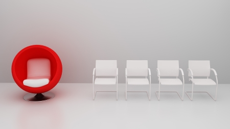 Red chair with 4 normal chairの写真素材