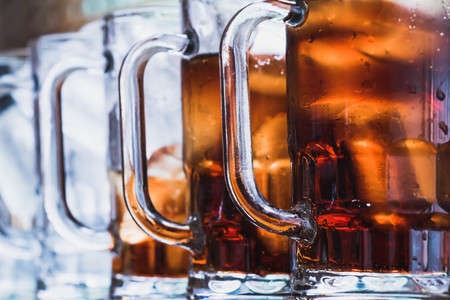 many glasses of black  softdrink