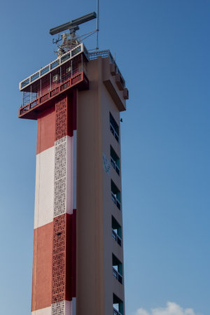 Chennai, Tamil Nadu / India - February 05 2020: View of lighthouse near marina beach against blue...