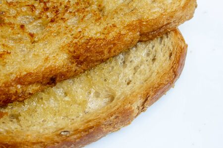 View of bread slices toasted with butter.の写真素材
