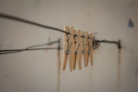 View of the wooden clips for holding clothes put for drying.の写真素材