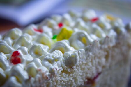 Delicious vanilla flavor cake with white cream frosting.