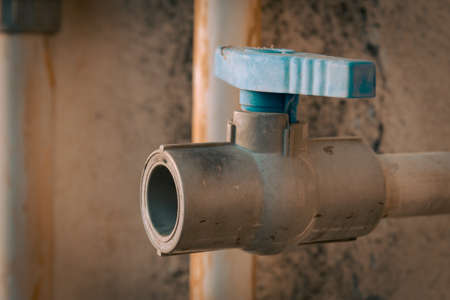 View of a plastic gate value to control the flow of any liquid in a pipe. Selective focusの写真素材