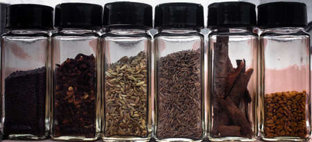 Common ingredients used in indian cooking. Spices and seeds backgroundの写真素材