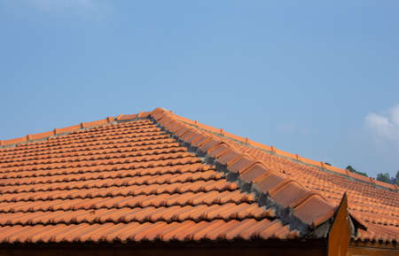 View of roof tiles on guest house. Retro styling of roof with tiles.