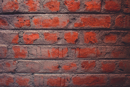 view of the brick work done for a wall in an under construction buildingの写真素材