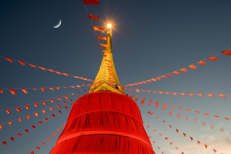 Decorated in red stupa in Wat Saket temple Bangkokの写真素材