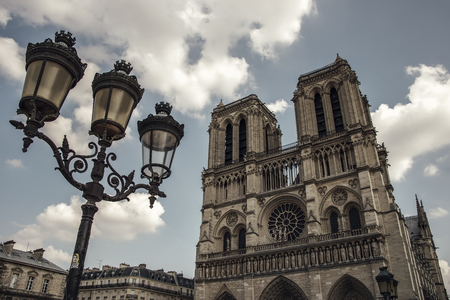 Facade of the cathedral Notre-Dame in Parisの写真素材