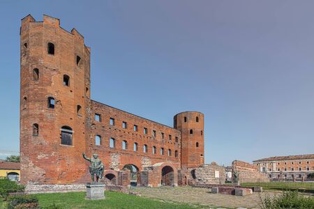 The Palatine Towers, an ancient Roman city gate in the Old Town of Turin, Italyの写真素材