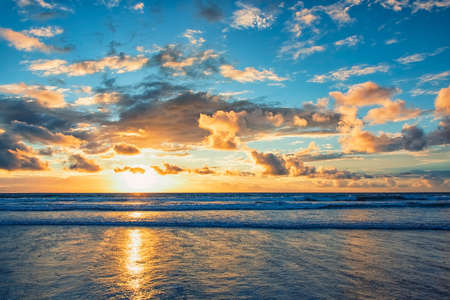 Sunset on a tropical beachの写真素材