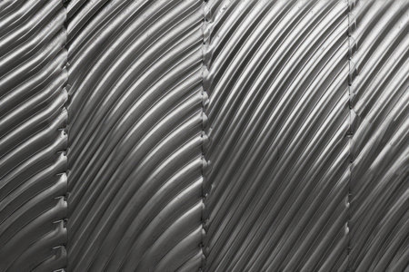 abstract background of black and white metal texture close-up.の素材