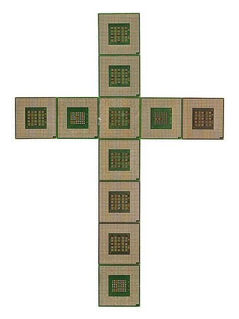Cross made of old and dirty microprocessors isolated on white backgroundの写真素材
