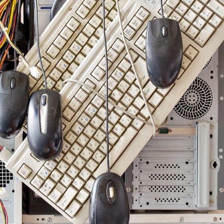 dirty old computers, keyboard, mouse for electronic recyclingの写真素材