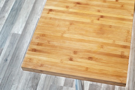 big wooden cutting board on the table in kitchenの写真素材