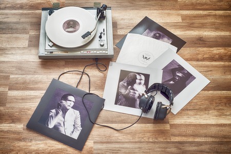 VILNIUS, LITHUANIA - 2015: Marilyn Manson vinyl record the ppale emperor album, record player with a vinyl on a wooden floor.のeditorial素材