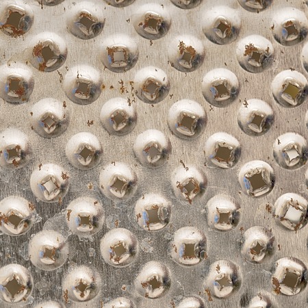 part of old rusty metal grater surfaceの写真素材