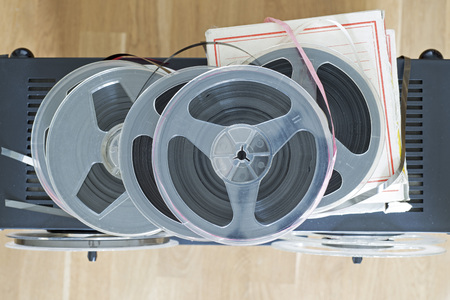 Vintage dusty magnetic audio reels on the analog tape recorderの写真素材