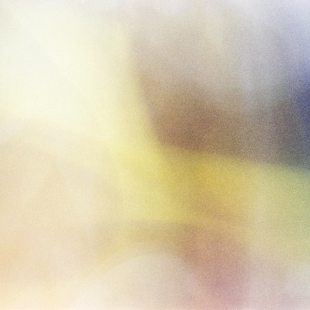 blurry unfocused background with light leaks and grainの写真素材