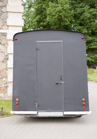 Part of retro food truck with closed doors