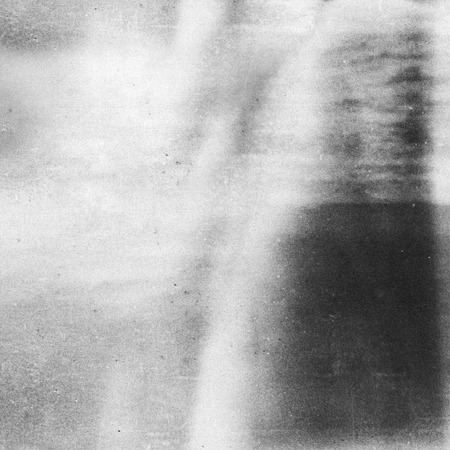 blurry unfocused background with light leaks, noise and grainの写真素材