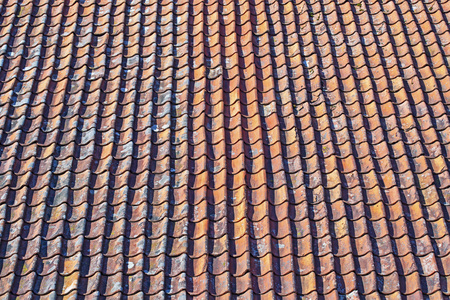Roof of red old grunge weathered tilesの写真素材