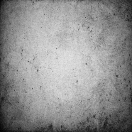 Black and white textured background with light leaks and grainの写真素材