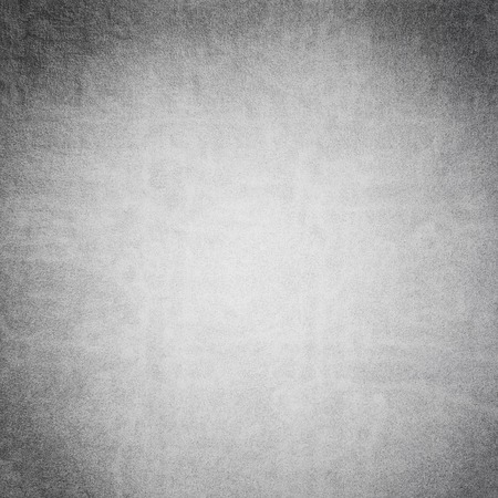 Black and white textured background with light leaks and grainの写真素材