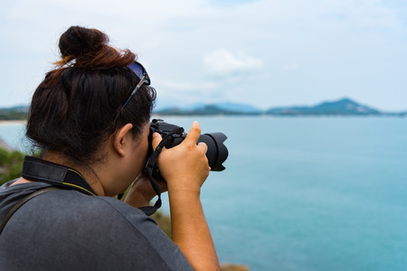 Thai lady taking picture on the view point, koh samui Thailand