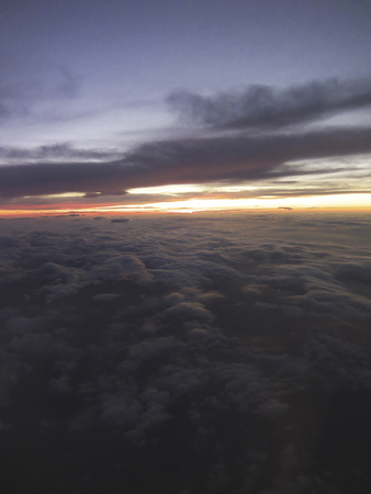 Sunset from the planeの写真素材