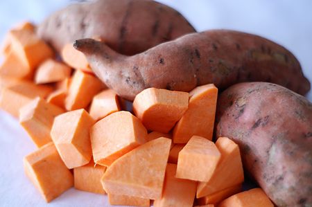 Sweet potatoes provide energy from starch and disease protection from mega doses of beta carotene.の写真素材