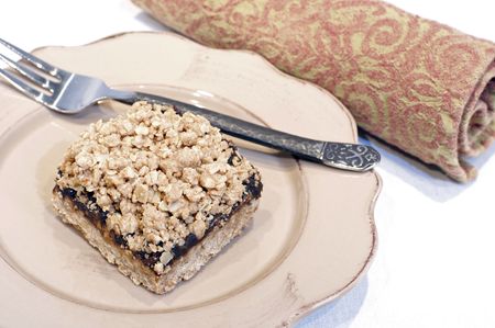 Oatmeal date square on white backgroundの写真素材