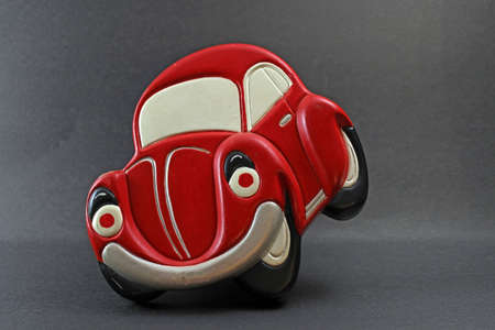 red toy car on black の写真素材