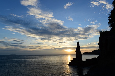 Sunset and the rock beachの素材