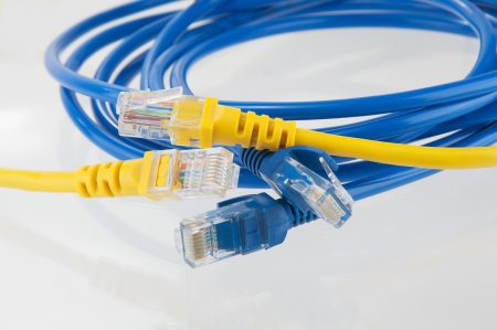 yellow and blue data cable on white background