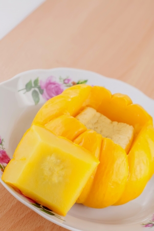 Egg custard in yellow pumpkinの写真素材