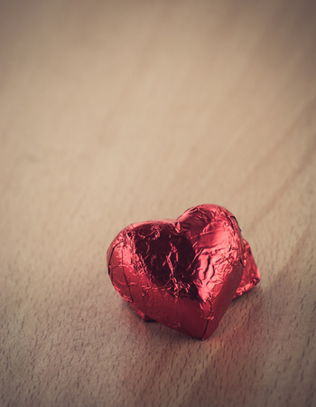 Red heart shape On Wood tableの写真素材