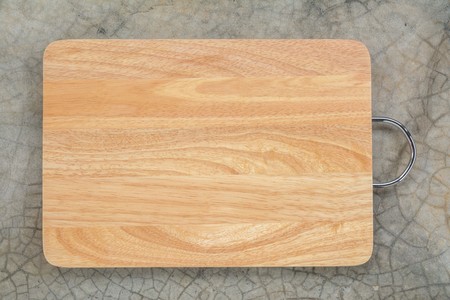 Light Wooden Plate Texture On Dark Grey Backgroundの写真素材