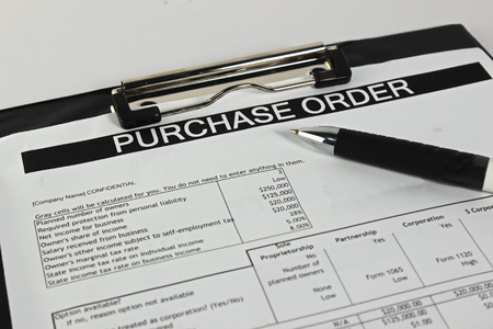 Purchase order form with penの写真素材