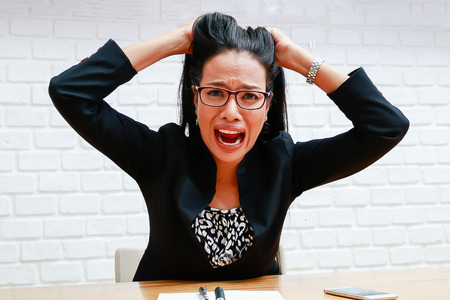 Businesswoman Are stressed with workの写真素材