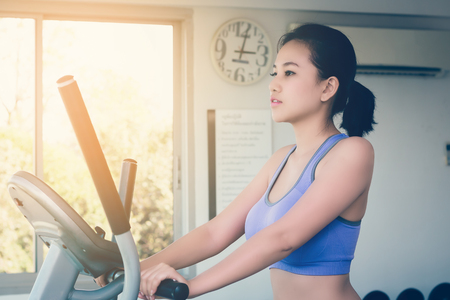 Beauty fitness woman doing exercises.Concept of healthy lifestyleの写真素材