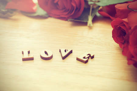 Say love via diamond ring and red rose to your lovers in Valentine's Day.の写真素材