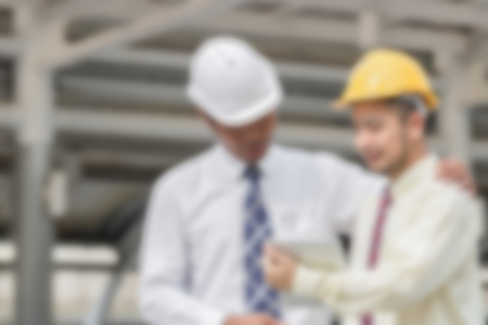 Blurred image of engineers are investigating the site works.の写真素材