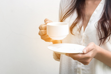 Woman drinking coffee in the morning.の写真素材