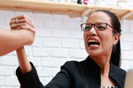 Businesswoman fighting