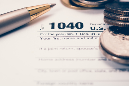 US tax form with pen  selective focus / taxation conceptの写真素材