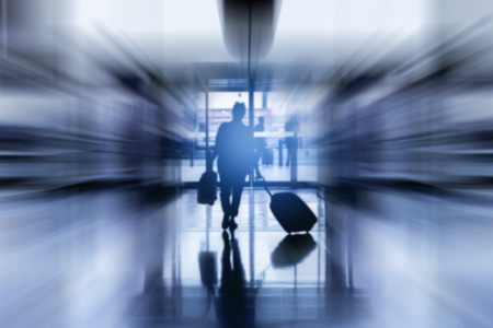 Blurred zoom of passengers in the airport.の写真素材